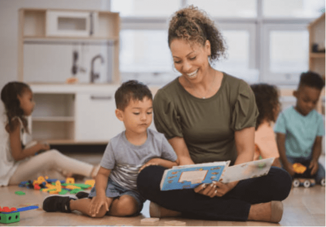 Adult-Parent-Teacher-Reading-with-Child