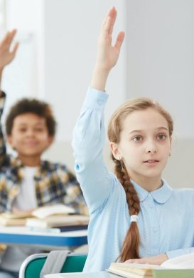 children-raising-hands-in-school.jpg